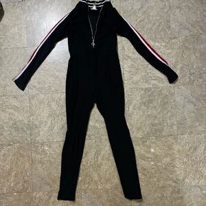 Black white and red quarter zip jumpsuit.